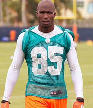 Miami Dolphins' Chad Ochocinco, who recently changed his name back to Chad Johnson, talking to reporters in Davie, Fla. The Dolphins terminated the six-time Pro Bowl receiver's contract about 24 hours after he was arrested in a domestic battery case involving his wife. Johnson was released from jail on $2,500 bond, after his wife accused him of head-butting her during an argument in front of their homeDolphins Johnson Arrest Football, Davie, USA