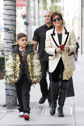 Beverly Hills, CA - Momager Kris Jenner gets her grandson Mason Disick an expensive looking Versace puffer jacket as they both go Christmas shopping in Beverly Hills with a bodyguard.Pictured: Kris Jenner, Mason Dash DisickBACKGRID USA 18 DECEMBER 2018 BYLINE MUST READ: Clint Brewer / BACKGRIDUSA: +1 310 798 9111 / usasales@backgrid.comUK: +44 208 344 2007 / uksales@backgrid.com*UK Clients - Pictures Containing ChildrenPlease Pixelate Face Prior To Publication*