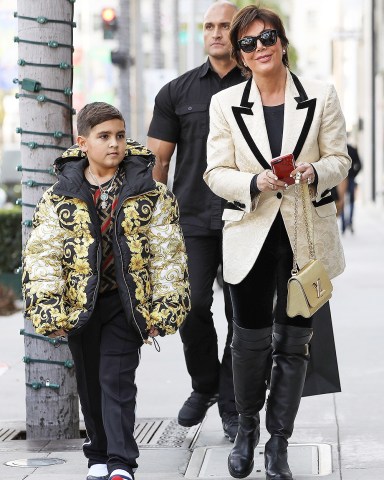 Beverly Hills, CA - Momager Kris Jenner gets her grandson Mason Disick an expensive looking Versace puffer jacket as they both go Christmas shopping in Beverly Hills with a bodyguard.Pictured: Kris Jenner, Mason Dash DisickBACKGRID USA 18 DECEMBER 2018 BYLINE MUST READ: Clint Brewer / BACKGRIDUSA: +1 310 798 9111 / usasales@backgrid.comUK: +44 208 344 2007 / uksales@backgrid.com*UK Clients - Pictures Containing ChildrenPlease Pixelate Face Prior To Publication*