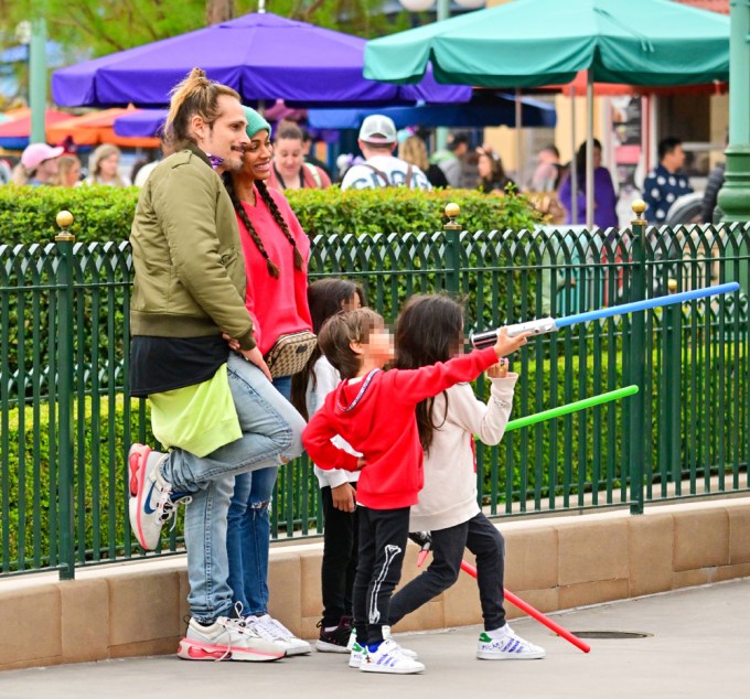 Zoe Saldana and Marco Perego Saldana enjoy a fun day at Disneyland with their kids