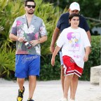 EXCLUSIVE: Scott Disick looks relaxed as he hits the beach with son Mason in Miami following Kourtney Kardashian's engagement announcement