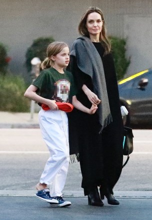 Los Angeles, CA  - Angelina Jolie and daughter Vivienne Marcheline pictured exiting a martial arts gym in L.A. this afternoon. The young red belt was chatting away while holding hands with her mom. Jolie wore a black maxi dress with a gray scarf over her shoulder and black leather booties.Pictured: Angelina Jolie, Vivienne Marcheline Jolie-PittBACKGRID USA 28 JANUARY 2019 USA: +1 310 798 9111 / usasales@backgrid.comUK: +44 208 344 2007 / uksales@backgrid.com*UK Clients - Pictures Containing ChildrenPlease Pixelate Face Prior To Publication*
