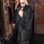 *EXCLUSIVE* Christina Aguilera and Paris Hilton hold hands while leaving dinner at TAO