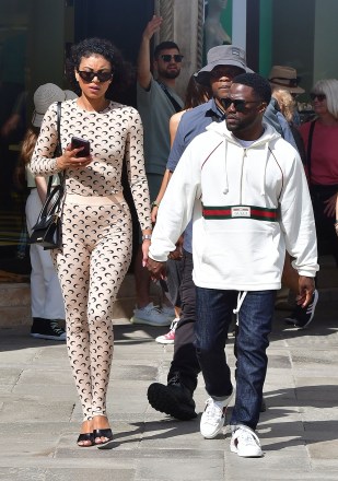 Venice, ITALY  - *EXCLUSIVE*  - Actor and comedian Kevin Hart take a well-earned break from his filming duties with his new movie 'Lift' as he enjoys a stroll and a bite to eat through the city of Venice with his wife Eniko Hart.Pictured: Kevin Hart, Eniko HartBACKGRID USA 13 MAY 2022 BYLINE MUST READ: Cobra Team / BACKGRIDUSA: +1 310 798 9111 / usasales@backgrid.comUK: +44 208 344 2007 / uksales@backgrid.com*UK Clients - Pictures Containing ChildrenPlease Pixelate Face Prior To Publication*