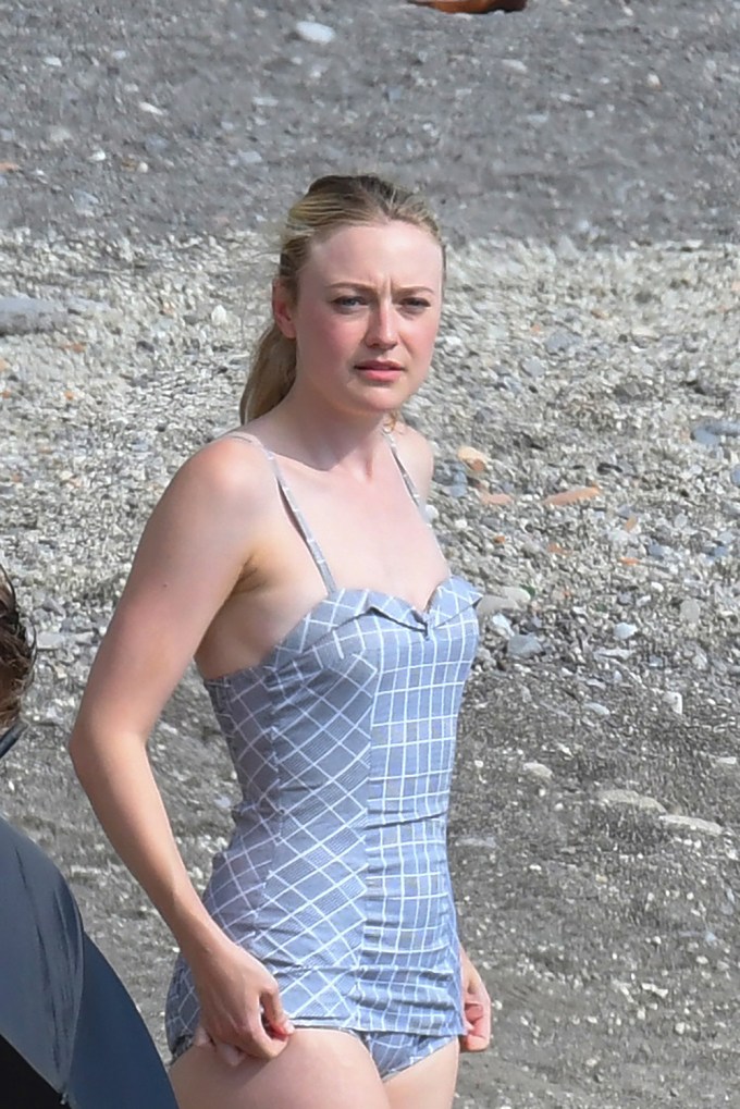 EXCLUSIVE: Dakota Fanning seen in a one-piece swimsuit filming “Ripley” in Strani, Amalfi Coast