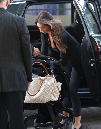 Sonni Pacheco, and her daughter, Ava Berlin Renner seen in Los Angeles.  The mother of Jeremy Renner's child and his child, Ava are seen at LAX.  The driver gets assistance with the stroller. Pictured: Sonni Pacheco,Ava Berlin Renner,Sonni PachecoAva Berlin RennerRef: SPL593410 130813 NON-EXCLUSIVEPicture by: SplashNews.comSplash News and PicturesLos Angeles: 310-821-2666New York: 212-619-2666London: +44 (0)20 7644 7656Berlin: +49 175 3764 166photodesk@splashnews.comWorld Rights