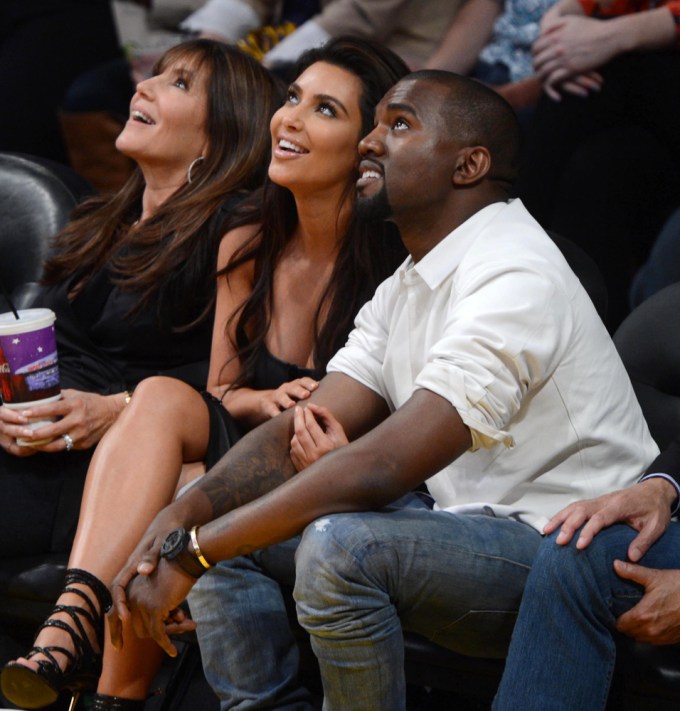 Kim Kardashian & Kanye West Cuddle At A Basketball Game