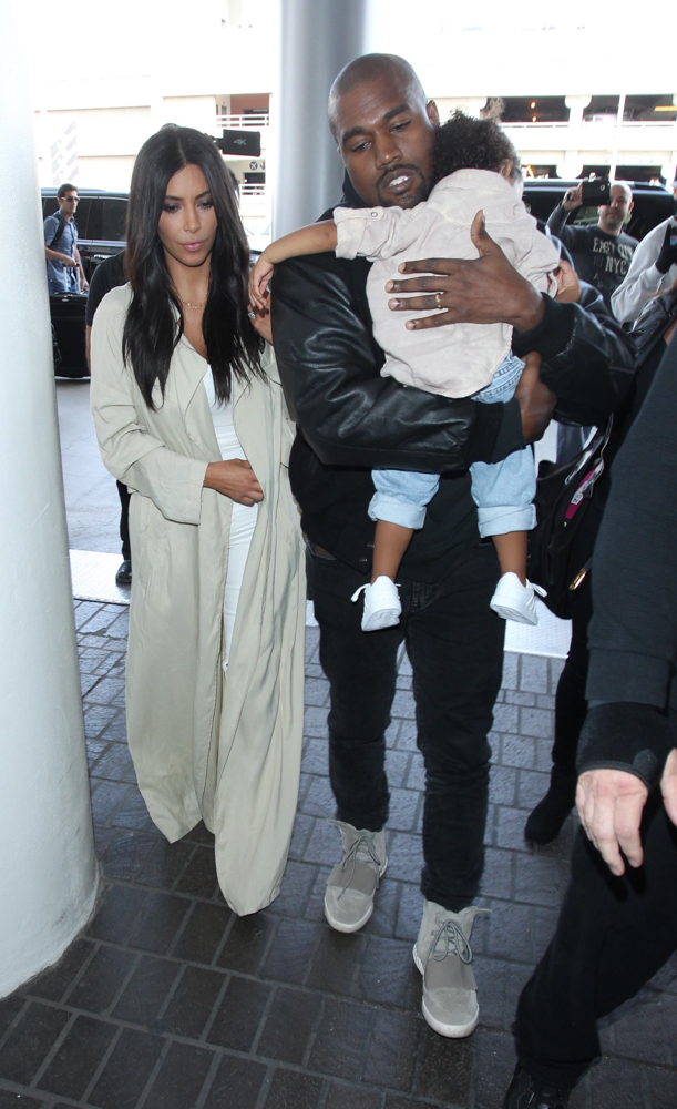 Kim Kardashian & Kanye West With Baby North