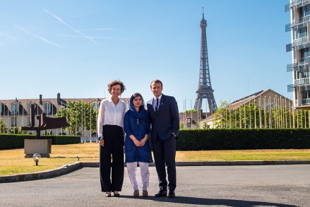 French President Emmanuel Macron (R) arrives with Nobel Peace Prize laureate Malala Yousafzai (C) and UNESCO'S Director-General Audrey Azoulay (L) at the UNESCO'S headquarter during the Education and development G7 ministers Summit, in Paris, France, 05 July 2019.
G7 Education and development ministers meeting in Paris, France - 05 Jul 2019