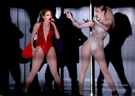 Jennifer Lopez, left, and Iggy Azalea perform at the 42nd annual American Music Awards at Nokia Theatre L.A. Live, in Los Angeles
42nd Annual American Music Awards - Show, Los Angeles, USA