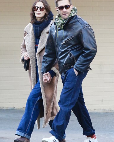 New York, NY  - *EXCLUSIVE*  - Jake Gyllenhaal and girlfriend Jeanne Cadieu hold hands during a romantic stroll in Manhattan’s SoHo neighborhood. The couple looked stylish and were shopping around the Downtown area a day before Thanksgiving.Pictured: Jake Gyllenhaal, Jeanne CadieuBACKGRID USA 23 NOVEMBER 2022 BYLINE MUST READ: BrosNYC / BACKGRIDUSA: +1 310 798 9111 / usasales@backgrid.comUK: +44 208 344 2007 / uksales@backgrid.com*UK Clients - Pictures Containing ChildrenPlease Pixelate Face Prior To Publication*
