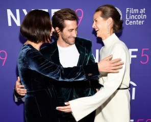 Writer-director Maggie Gyllenhaal, left, brother Jake Gyllenhaal and Jake's girlfriend Jeanne Cadieu pose together at a special screening of "The Lost Daughter" at Alice Tully Hall during the 59th New York Film Festival on2021 NYFF - "The Lost Daughter" Screening, New York, United States - 29 Sep 2021