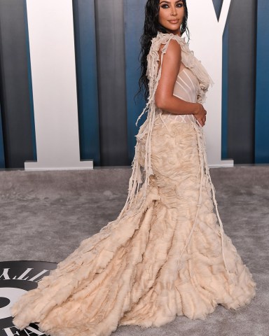 Kim Kardashian West Vanity Fair Oscar Party, Arrivals, Los Angeles, USA - 09 Feb 2020 Wearing Alexander McQueen Same Outfit as catwalk model *10431326k