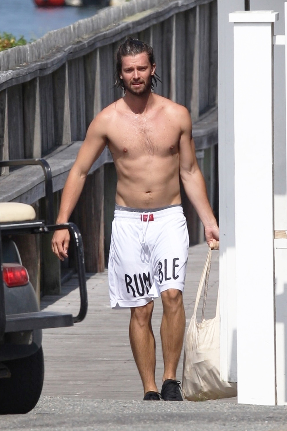 *EXCLUSIVE* A shirtless Patrick Schwarzenegger is seen in Hyannisport while out running errands