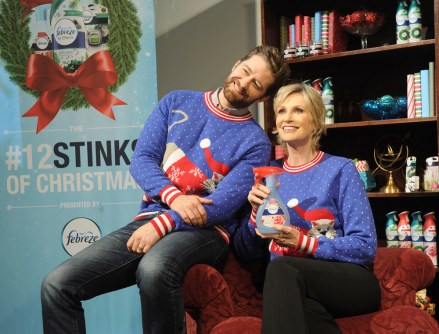 Here is Jane Lynch, 55, cozying up with a pug dog and her Glee costar Matthew Morrison, 37. The actors were both involved with '12 Stinks of Christmas' campaign from air freshener brand Febreze. "When the turkey's burning and your bathroom is seeing a lot of foot traffic from party guests, it hits you: the holidays stink," said the The 40-Year-Old Virgin star. Morrison, who also performs on Broadway, has also collaborated with his former TV co-star for a jolly holiday duet: "We always have such an amazing time together," he said. Pictured: Jane Lynch gets festive with Matthew Morrison and Doug the Pug dog.,Jane Lynch gets festive with Matthew MorrisonDoug the Pug dog.Ref: SPL1193030 101215 NON-EXCLUSIVEPicture by: SplashNews.comSplash News and PicturesLos Angeles: 310-821-2666New York: 212-619-2666London: +44 (0)20 7644 7656Berlin: +49 175 3764 166photodesk@splashnews.comWorld Rights