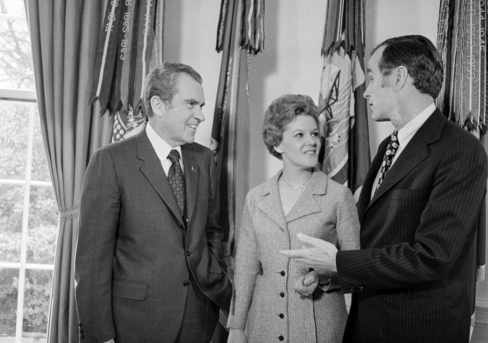 Richard Nixon, George H.W. Bush, George Bush, Janet Johnston President Richard Nixon is the listener in his White House Oval Office as George Bush, chairman of the Republican National Committee talks with him, . The interested spectator at center is Janet Johnston, co-chairman of the RNC
Nixon Bush, Washington, USA