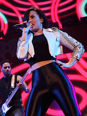 Demi Lovato performs onstage during 93.3 FLZ's Jingle Ball 2014 at Amalie Arena, in Tampa, Florida93.3 FLZ's Jingle Ball 2014 - Show, Tampa, USA - 22 Dec 2014