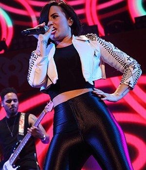 Demi Lovato performs onstage during 93.3 FLZ's Jingle Ball 2014 at Amalie Arena, in Tampa, Florida93.3 FLZ's Jingle Ball 2014 - Show, Tampa, USA - 22 Dec 2014