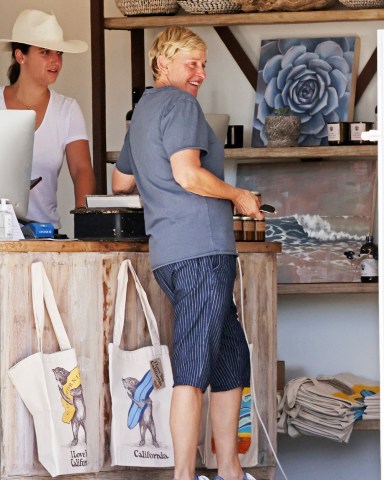 Montecito, CA  - *EXCLUSIVE*  - Ellen DeGeneres and a friend spent hours scouring upscale garden boutique 'The Well' to decorate her expansive property portfolio. The retired talkshow host spent almost two hours making furniture orders and was seen carrying a book on English Sculptor Henry Moore and a vintage wooden box to her limited edition Porsche 911 Targa.  Pictured: Ellen DeGeneres  BACKGRID USA 4 AUGUST 2021   USA: +1 310 798 9111 / usasales@backgrid.com  UK: +44 208 344 2007 / uksales@backgrid.com  *UK Clients - Pictures Containing Children Please Pixelate Face Prior To Publication*