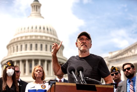 Veterans advocate Jon Stewart points toward the Senate during an impassioned speech condemning Republican Senators for voting against the Honoring Our PACT Act, and calling them cowards.  The legislation would have established a connection between military service and exposure to toxins via burn pits, easing access to healthcare for veterans and active duty members.  The bill passed the Senate with 84 votes, but Republican Senators objected, claiming it contained unrelated spending.
Jon Stewart speaks at conference on Honoring Our PACT Act at Capitol, Washington, United States - 28 Jul 2022