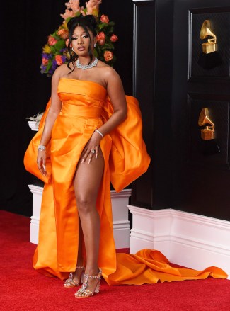 Megan Thee Stallion arrives at the 63rd Annual Grammy Awards March 14 at the Los Angeles Convention Center Featuring Live and Recorded Segments 63rd Annual Grammy Awards - Arrivals, Los Angeles, United States - 14 Mar 2021 Wearing Dolce & Gabbana, Chopard