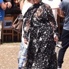 Kris Jenner looks stylish in a monochrome star-printed dress shopping with Guilherme Siqueira in Portofino