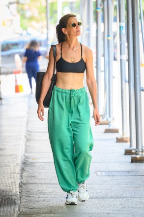 New York, NY  - Tom Cruise's ex-wife, Katie Holmes, stopped traffic just by wearing a sports bra and casual green trousers.Pictured: Katie HolmesBACKGRID USA 25 JULY 2023 BYLINE MUST READ: Ave Phoenix / BACKGRIDUSA: +1 310 798 9111 / usasales@backgrid.comUK: +44 208 344 2007 / uksales@backgrid.com*UK Clients - Pictures Containing ChildrenPlease Pixelate Face Prior To Publication*