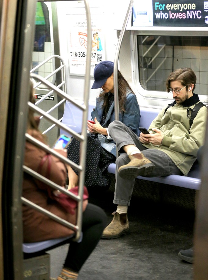 Katie Holmes rides the subway in NYC