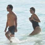 *EXCLUSIVE*  Mark Wahlberg sports a BAD sunburn on his arms while out enjoying a day at the beach in Barbados!
