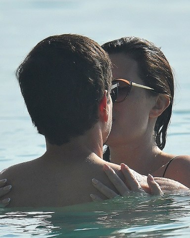 Bridgetown, BARBADOS  - *EXCLUSIVE*  - Actor Mark Wahlberg and his wife Rhea Durham show off their love and affection as they take a dip in the sea during a family holiday in the beautiful Caribbean Island of Barbados on Sandy Lane Hotel's beach. The Daddy's home actor was seen sporting a pretty bad sunburn on his arm.

Pictured: Mark Wahlberg - Rhea Durham

BACKGRID USA 23 DECEMBER 2022 

BYLINE MUST READ: T. Atwell/S.King@246Paps / BACKGRID

USA: +1 310 798 9111 / usasales@backgrid.com

UK: +44 208 344 2007 / uksales@backgrid.com

*UK Clients - Pictures Containing Children
Please Pixelate Face Prior To Publication*