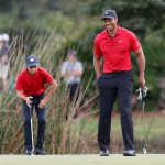 Tiger Woods smiles while walking on the second green during the second round of the PNC Championship golf tournament, in Orlando, Fla
PNC Championship Golf, Orlando, United States - 19 Dec 2021