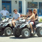 Bruce Jenner shows off his ATV riding skills in Greece while taking photos