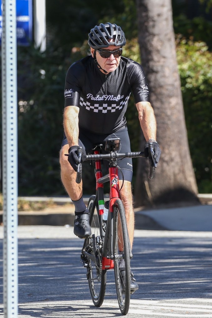 Harrison Ford Rides A Bike
