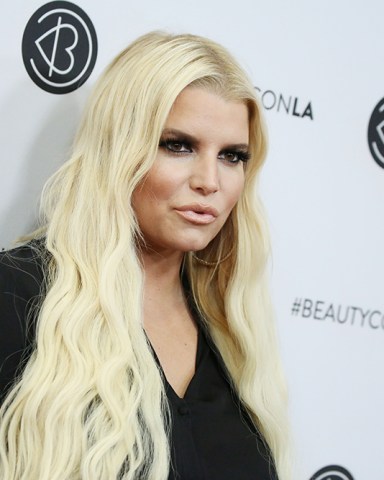 Jessica Simpson dons nude slip dress to celebrate Earth Day in Malibu with  her family