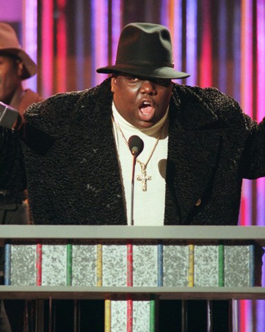 NOTORIOUS BIG FILE** The family of rapper Notorious B.I.G., shown clutching his awards at the Billboard Music Awards in New York,, has asked a Los Angeles judge for permission to expand their wrongful-death lawsuit against the city of Los Angeles. Notorious B.I.G., born Christopher Wallace, was fatally shot in 1997 in a sport utility vehicle shortly after a party in Los AngelesNOTORIOUS BIG SUIT, NEW YORK, USA