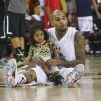 Chris Brown and Royalty at charity basketball