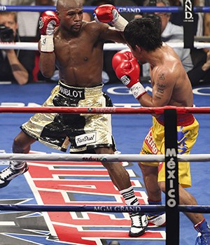 Editorial use only. No merchandising.Mandatory Credit: Photo by BPI/Shutterstock (4743573ac)Floyd Mayweather Jr v Manny PacquiaoBoxing - WBC/WBA/WBO Welterweight Title Fight Floyd Mayweather v Manny Pacquiao MGM Grand, Las Vegas, United States - 2 May 2015