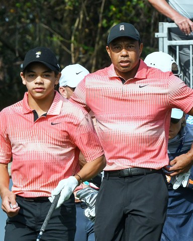 Tiger Woods and his son Charlie Woods wait to tee off on the first hole during the first round of the 2022 PNC Championship at The Ritz-Carlton Golf Club in Orlando.
PNC Championship Golf Tournament in Orlando, US - 17 Dec 2022