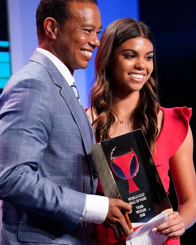 Tiger Woods stands with his daughter Sam during his induction into the World Golf Hall of Fame, in Ponte Vedra Beach, Fla
Hall of Fame Golf, Ponte Vedra Beach, United States - 09 Mar 2022