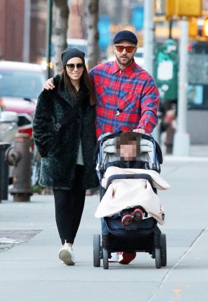 Justin Timberlake and Jessica Biel are pictured with their son Silas after having a late afternoon lunch at Bubby’s restaurant in Downtown Manhattan. The couple was all smiles except for their son who was having a tantrum during their outing. Justin and Jessica looked to be in a great mood as they were seen chatting and being very affectionate with each other. Justin was also seen sporting a Mickey Mouse plaid shirt. 23 Feb 2020 Pictured: Justin Timberlake, Jessica Biel and son Silas. Photo credit: LRNYC / MEGA TheMegaAgency.com +1 888 505 6342 (Mega Agency TagID: MEGA616467_001.jpg) [Photo via Mega Agency]