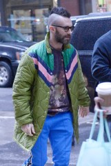 Adam Levine wears a colorful green jacket coat, blue pants and Nike sneakers at the NBC Upfronts in NYCPictured: Adam LevineRef: SPL5089147 130519 NON-EXCLUSIVEPicture by: Edward Opi / SplashNews.comSplash News and PicturesLos Angeles: 310-821-2666New York: 212-619-2666London: 0207 644 7656Milan: 02 4399 8577photodesk@splashnews.comWorld Rights
