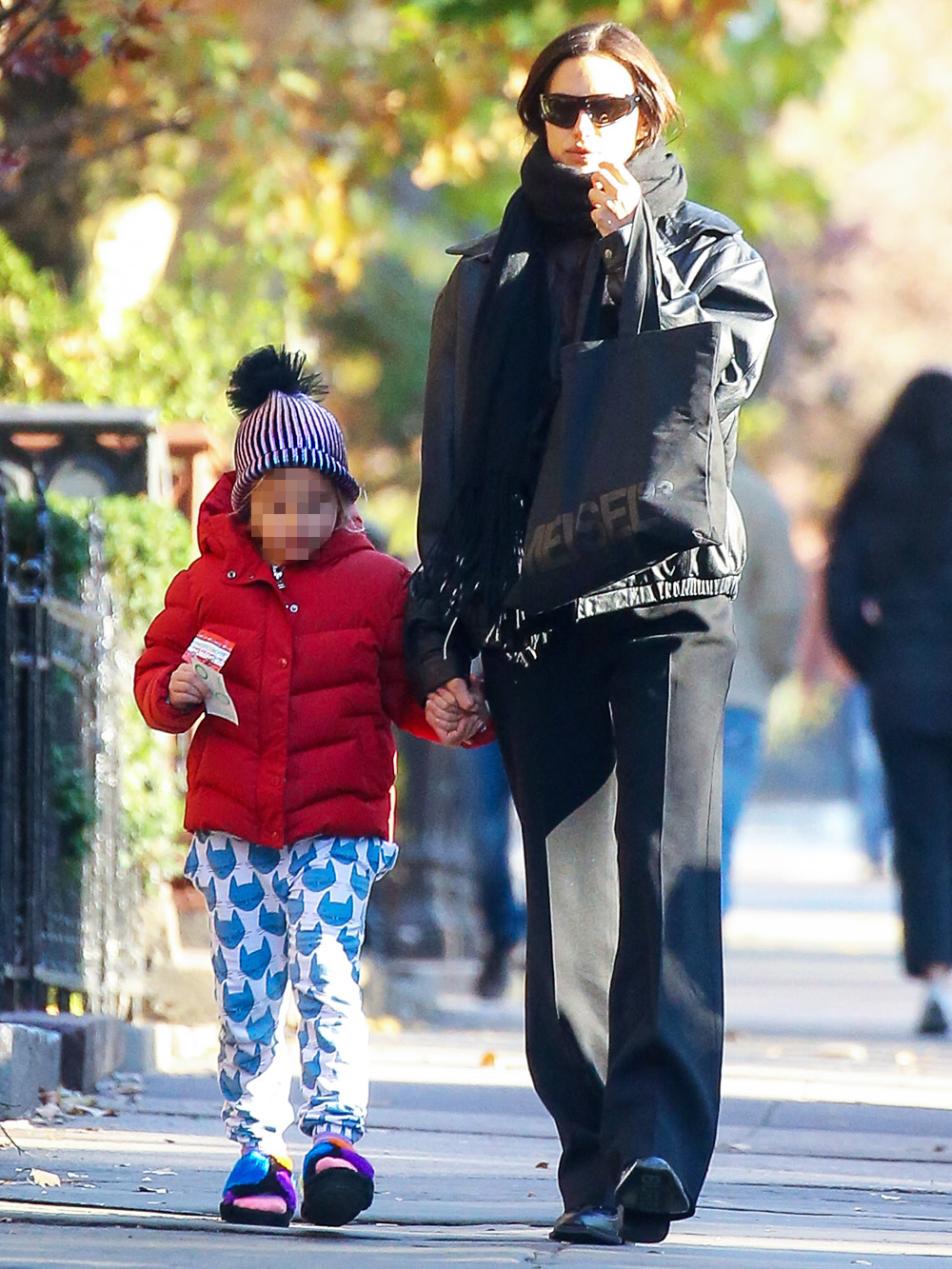 EXCLUSIVE: Irina Shayk and her daughter Lea Cooper are seen taking a stroll in New York City