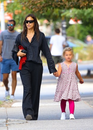 New York, NY  - *EXCLUSIVE*  - Irina Shayk is spotted wearing all black as she holds her daughter by the hand during a neighborly stroll in New York City.Pictured: Irina ShaykBACKGRID USA 8 SEPTEMBER 2022 BYLINE MUST READ: Fernando Ramales / BACKGRIDUSA: +1 310 798 9111 / usasales@backgrid.comUK: +44 208 344 2007 / uksales@backgrid.com*UK Clients - Pictures Containing ChildrenPlease Pixelate Face Prior To Publication*