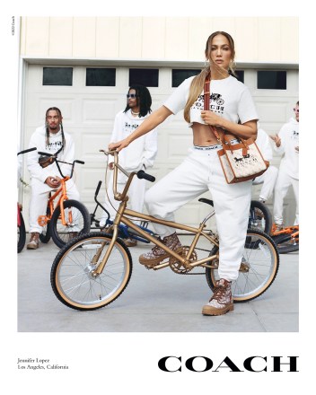 Jennifer Lopez gets on her BMX bike as she stars in a new Coach fashion campaign. The 52-year-old star appears alongside Megan Thee Stallion in the spring 2022 'That's My Ride' collaboration. Noah Beck, Wisdom Kaye and Koki also appear. Director Stuart Vevers worked in collaboration with director and photographer Tyler Mitchell on the campaign, which "reimagines Coach’s iconic Horse and Carriage code and first-ever house logo in a pop palette for a new generation". Rapper Megan Thee Stallion, meanwhile, poses in a fairground at a seaside resort in the images. Stuart Vevers said: "Joyful and optimistic, Spring 2022 celebrates our house codes through the point-of-view of a new generation. “It expresses what I’ve always loved about Coach, which is the way our heritage can be a platform for individual expression and bold ideas that shape the future.” Editorial usage. Credit - Courtesy of Coach / MEGA. 25 Jan 2022 Pictured: Jennifer Lopez for Coach. Photo credit: Courtesy of Coach/MEGA TheMegaAgency.com +1 888 505 6342 (Mega Agency TagID: MEGA822558_002.jpg) [Photo via Mega Agency]