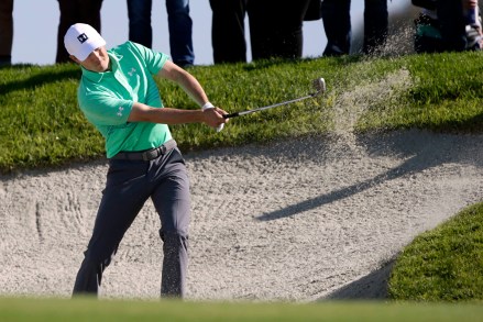 Jordan Spieth hits out of a sand trap on the second fairway of the Torrey Pines South Course during the first round The Farmers Insurance golf tournament in San Diego
Farmers Insurance Golf, San Diego, USA - 23 Jan 2020