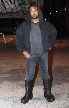 Kanye West Strikes A Defiant Pose As He Steps Out In Los Angeles Amid Bitter Custody Dispute.  The rap megastar looked somber amid his personal woes as he was spotted outside his hotel on Monday evening.  The late night outing comes amid his bitter ongoing custody dispute with ex Kim Kardashian, and his flurry of social media attacks against her new beau Pete Davidson.  Ye has insisted he is standing up for his rights as a good father committed to protecting his family.  Pictured: YE,Kanye West Ref: SPL5296460 150322 NON-EXCLUSIVE Picture by: PhotosByDutch / SplashNews.com Splash News and Pictures USA: +1 310-525-5808 London: +44 (0)20 8126 1009 Berlin: +49 175 3764 166 photodesk@splashnews.com World Rights
