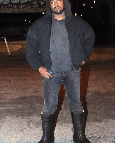 Kanye West Strikes A Defiant Pose As he Steps Out In Los Angeles Amid Bitter Custody Dispute. The rap megastar looked somber amid his personal woes as he was spotted outside his hotel on Monday evening.  The late night outing comes amid his bitter ongoing custody dispute with ex Kim Kardashian, and his flurry of social media attacks against her new beau Pete Davidson.  Ye has insisted he's standing up for his rights as a good father committed to protecting his family.  Pictured: YE,Kanye West Ref: SPL5296460 150322 NON-EXCLUSIVE Picture by: PhotosByDutch / SplashNews.com  Splash News and Pictures USA: +1 310-525-5808 London: +44 (0)20 8126 1009 Berlin: +49 175 3764 166 photodesk@splashnews.com  World Rights