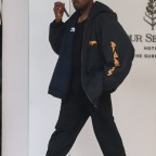 Kanye West leaves the Four Seasons Hotel in Miami Beach