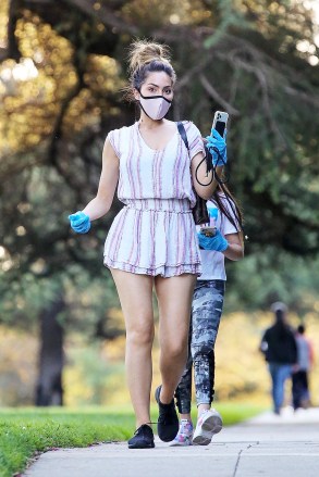 Los Feliz, CA  - *EXCLUSIVE*  - A makeup-free and masked Farrah Abraham and her daughter Sophia are glued to their phones during a walk together in Los Feliz during the COVID-19 safer at home order.Pictured: Farrah AbrahamBACKGRID USA 22 APRIL 2020 BYLINE MUST READ: W Blanco / BACKGRIDUSA: +1 310 798 9111 / usasales@backgrid.comUK: +44 208 344 2007 / uksales@backgrid.com*UK Clients - Pictures Containing ChildrenPlease Pixelate Face Prior To Publication*