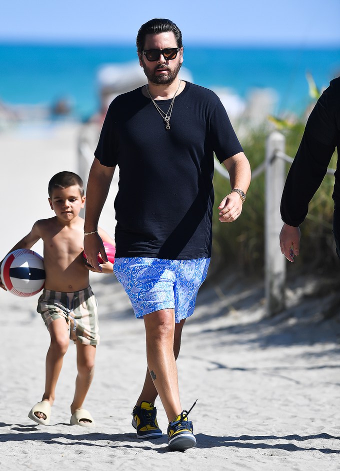 Scott Disick And Reign at the beach